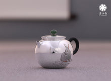 Load image into Gallery viewer, The work of Mr. Li Fuming, a national intangible cultural heritage inheritor, is "9999 pure silver, handmade, carved rabbit welcoming spring, pure silver teapot/Gong Dao Bei/kettle"