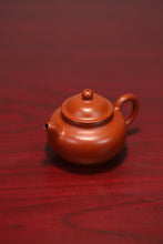 Load image into Gallery viewer, The Chinese Yixing purple clay teapot "Zhou Pi Zhu Ni Lotus Seed Teapot" is completely handmade.