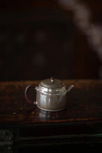 Load image into Gallery viewer, Carrying Philosophy in a Vessel: The Philosophical Reflection of Time in the "Non-Delusion" Silver Teapot