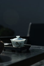 Load image into Gallery viewer, The Harmony of Tea Aroma and the Charm of Tea Ware: The Beauty of the Wuyi Mountain Ink-colored Porcelain Gaiwan with the Image of Matouyan