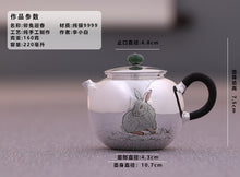 Load image into Gallery viewer, The work of Mr. Li Fuming, a national intangible cultural heritage inheritor, is "9999 pure silver, handmade, carved rabbit welcoming spring, pure silver teapot/Gong Dao Bei/kettle"