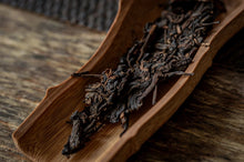 Load image into Gallery viewer, Explore the Charm of Time: Tasting the Grade B Green Seal Pu-erh Raw Tea from the 1990s
