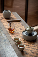 Load image into Gallery viewer, The 2022 Wuyi Rock Tea "Hu Xiao Yan Rou Gui" is made using traditional craftsmanship.