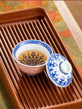Load image into Gallery viewer, "hand-painted Thousand Buddhas Cinnabar gaiwan" with a capacity of 150ml and 100ml.
