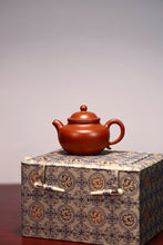 Load image into Gallery viewer, The Chinese Yixing purple clay teapot "Zhou Pi Zhu Ni Lotus Seed Teapot" is completely handmade.