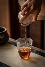 Load image into Gallery viewer, Explore the Charm of Time: Tasting the Grade B Green Seal Pu-erh Raw Tea from the 1990s