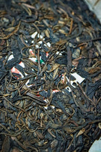 Load image into Gallery viewer, Explore the Charm of Time: Tasting the Grade B Green Seal Pu-erh Raw Tea from the 1990s