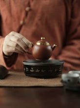 Load image into Gallery viewer, "Black Glazed and Gold-traced Tripod Tea Saucer: An Exquisite Choice on the Tea Table"