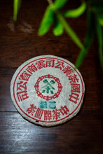Load image into Gallery viewer, Explore the Charm of Time: Tasting the Grade B Green Seal Pu-erh Raw Tea from the 1990s
