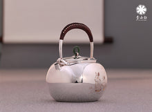 Load image into Gallery viewer, The work of Mr. Li Fuming, a national intangible cultural heritage inheritor, is "9999 pure silver, handmade, carved rabbit welcoming spring, pure silver teapot/Gong Dao Bei/kettle"