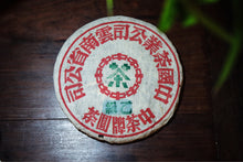 Load image into Gallery viewer, Explore the Charm of Time: Tasting the Grade B Green Seal Pu-erh Raw Tea from the 1990s