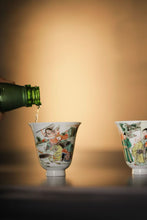 Load image into Gallery viewer, Imitation Kangxi Period Five-Colored Porcelain Cup Pair: The Romance of the Western Chamber Scenes