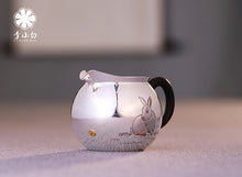 Load image into Gallery viewer, The work of Mr. Li Fuming, a national intangible cultural heritage inheritor, is "9999 pure silver, handmade, carved rabbit welcoming spring, pure silver teapot/Gong Dao Bei/kettle"