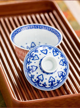 Load image into Gallery viewer, "hand-painted Thousand Buddhas Cinnabar gaiwan" with a capacity of 150ml and 100ml.