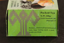 Load image into Gallery viewer, Tongxinshe Teahouse Collection Recommendation: Dayi 2003 Flower Label Panda Tuocha – A Time-Honored Impression of Menghai Old Tea