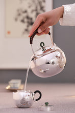 Load image into Gallery viewer, The work of Mr. Li Fuming, a national intangible cultural heritage inheritor, is "9999 pure silver, handmade, carved rabbit welcoming spring, pure silver teapot/Gong Dao Bei/kettle"