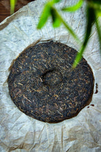Load image into Gallery viewer, Explore the Charm of Time: Tasting the Grade B Green Seal Pu-erh Raw Tea from the 1990s