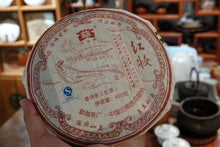 Load image into Gallery viewer, Menghai Tea Factory Dayi 701 Hongzhuang Raw Pu'er Tea: The Flavor and Value of Years of Aging