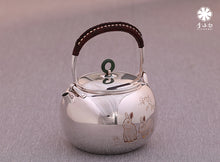 Load image into Gallery viewer, The work of Mr. Li Fuming, a national intangible cultural heritage inheritor, is "9999 pure silver, handmade, carved rabbit welcoming spring, pure silver teapot/Gong Dao Bei/kettle"