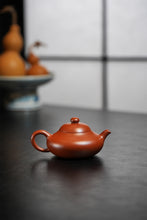 Load image into Gallery viewer, Curated by Tongxinshe Teahouse | Mini Chunquan Teapot: Timeless Antique Beauty Beyond Expectation‼️
"Aili · Chunquantang Mark" | 100ml Raw Ore Da Hong Pao Red Clay
Fully Handmade Antique Recreation by Master Wang Yajun
