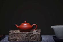 Load image into Gallery viewer, A collection-level handmade purple clay teapot, made by Master Hui Xiangyun, the 15th generation descendant of Hui Mengchen, the "Rare Da Hong Pao Zhu Ni Han Zhu  Teapot" with a capacity of 100cc.