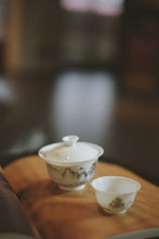 Load image into Gallery viewer, The Harmony of Tea Aroma and the Charm of Tea Ware: The Beauty of the Wuyi Mountain Ink-colored Porcelain Gaiwan with the Image of Matouyan