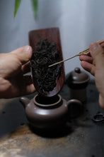 Load image into Gallery viewer, Recommendation of Tongxinshe Teahouse: Embrace the Elegance of the Lotus Seed Teapot in Your Hands