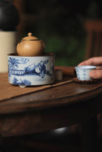 Load image into Gallery viewer, Seeking an Elegant Retreat, Treasuring a Piece of Ingenuity: The Beauty of Tongxin She Teahouse and the "Jiaolu Yi" Blue-and-White Pot Stand