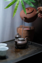 Load image into Gallery viewer, Recommendation of Tongxinshe Teahouse: Embrace the Elegance of the Lotus Seed Teapot in Your Hands