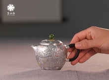 Load image into Gallery viewer, The Millennium - old Ingenuity in the Silver Teapot, Brewing a Good Taste of Time Dragon - soaring Gold - and - Silver Inlaid Pure Silver Teapot”