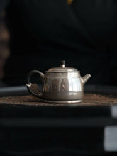 Load image into Gallery viewer, Carrying Philosophy in a Vessel: The Philosophical Reflection of Time in the "Non-Delusion" Silver Teapot