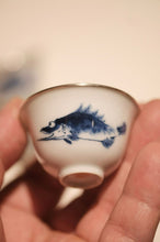 Load image into Gallery viewer, Tongxin She · Blue and White Mandarin Fish Silver-Rimmed Tasting Cup Set (3 Cups)