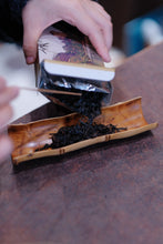 Load image into Gallery viewer, Treasured at Tongxinshe Teahouse: A Brew of 1998 Jiuqu Rou Gui Rock Tea