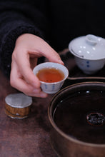 Load image into Gallery viewer, Treasured at Tongxinshe Teahouse: A Brew of 1998 Jiuqu Rou Gui Rock Tea