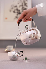 Load image into Gallery viewer, The work of Mr. Li Fuming, a national intangible cultural heritage inheritor, is "9999 pure silver, handmade, carved rabbit welcoming spring, pure silver teapot/Gong Dao Bei/kettle"