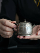 Load image into Gallery viewer, Carrying Philosophy in a Vessel: The Philosophical Reflection of Time in the "Non-Delusion" Silver Teapot
