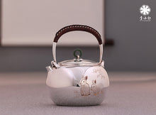 Load image into Gallery viewer, The work of Mr. Li Fuming, a national intangible cultural heritage inheritor, is "9999 pure silver, handmade, carved rabbit welcoming spring, pure silver teapot/Gong Dao Bei/kettle"