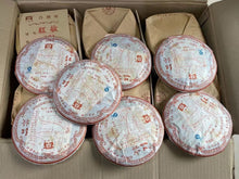Load image into Gallery viewer, Menghai Tea Factory Dayi 701 Hongzhuang Raw Pu'er Tea: The Flavor and Value of Years of Aging