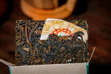 Load image into Gallery viewer, Five Golden Flowers Old Sheng Puer 250g/brick exported to Hong Kong and Taiwan in 1998