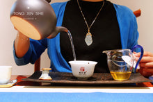 Load image into Gallery viewer, Puer Sheng Tea, an Old village in Iceland, is 780 years old