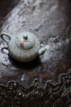 Load image into Gallery viewer, Pottery Meng Chen small teapot with silver mouth spout, elegant and playful, with smooth water flow and delicate hand-painted patterns.
