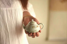 Load image into Gallery viewer, Pottery Meng Chen small teapot with silver mouth spout, elegant and playful, with smooth water flow and delicate hand-painted patterns.