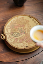 Load image into Gallery viewer, &quot;round water - storage purple sand tea tray with a carved unicorn&quot;.
