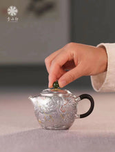 Load image into Gallery viewer, The Millennium - old Ingenuity in the Silver Teapot, Brewing a Good Taste of Time Dragon - soaring Gold - and - Silver Inlaid Pure Silver Teapot”
