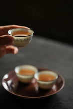 Load image into Gallery viewer, Tongxin She Teahouse · Tea Ware Selection Blue and White Eggshell Cup with Silver Rim &amp; Seal Script Calligraphy A Soul-Stirring Literati Teacup, the Perfect Companion for Gongfu Tea.
