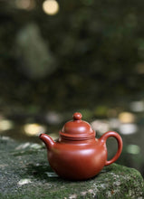 Load image into Gallery viewer, The Elegance of the Duoqiu Teapot: A Appreciation of Huixiangyun&#39;s Zhuni Dahongpao Duoqiu Teapot
