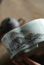 Load image into Gallery viewer, Ink-colored Landscape Copper-top Tea Boat Tongxinshe Teahouse Recommendation A tea session, with mountains and rivers captured on the vessel. 墨彩山水铜面茶船/壶承
