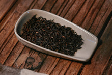 Load image into Gallery viewer, Aged Fragrance, Craftsmanship Legacy: Tasting of Tongxinshe Teahouse's 90s Vintage Imperial Pu'er Ripe Tea
