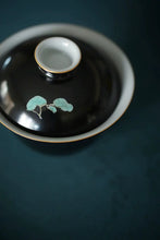 Load image into Gallery viewer, &quot;Jingdezhen ink-ground ancient color with gold-painted gaiwan&quot;.
