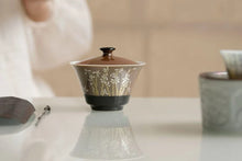 Load image into Gallery viewer, Selected by Tongxin She Teahouse
Sauce Glaze Gold &amp; Silver Inlaid Orchid Courtyard Two-Piece Gaiwan
